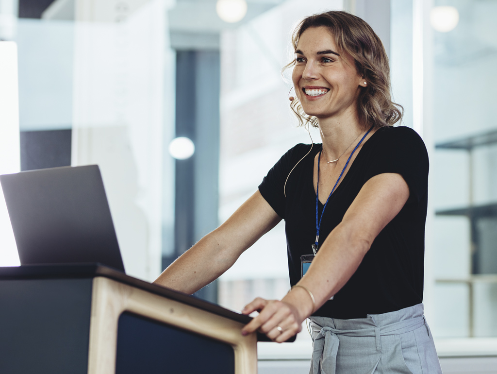 a GWSB professor lectures students during a class