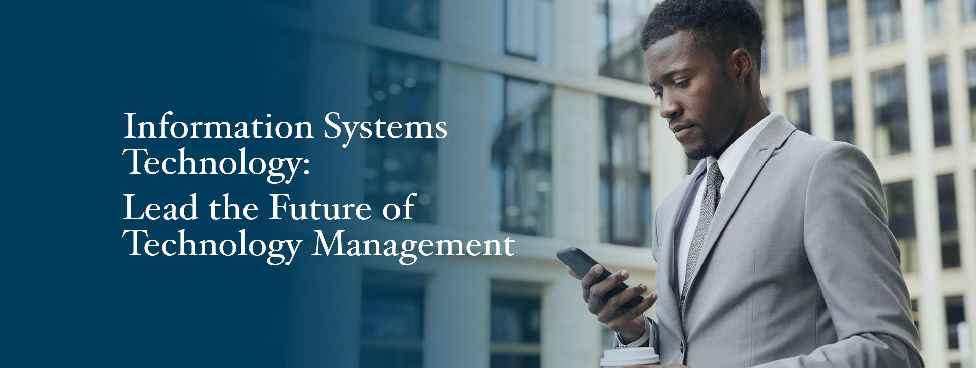 Information Systems Technology: Lead the Future of Technology Management. Image shows a man in a light grey suit outside a building glancing down at his phone.
