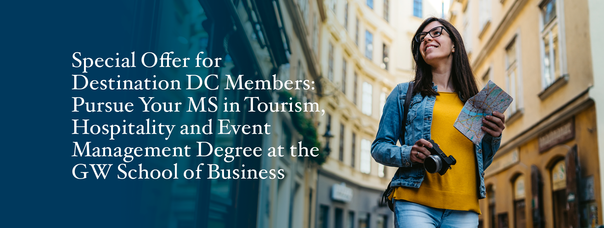 Destination DC Exclusive: Pursue Your MS in Tourism, Hospitality and Event Management Degree. Image shows a smiling woman walking through a city carrying a camera and a map.